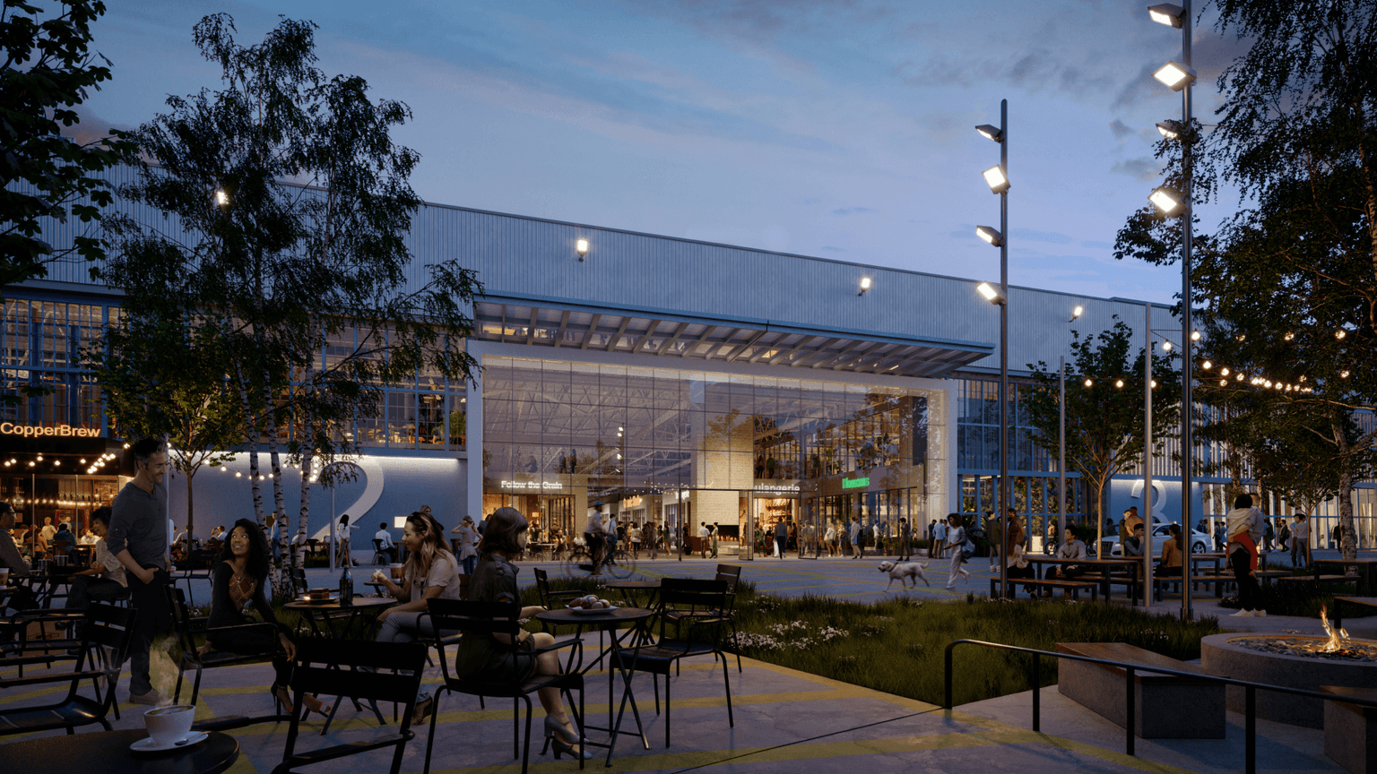 A vibrant, illuminated new mall at night, bustling with shoppers and adorned with colorful lights